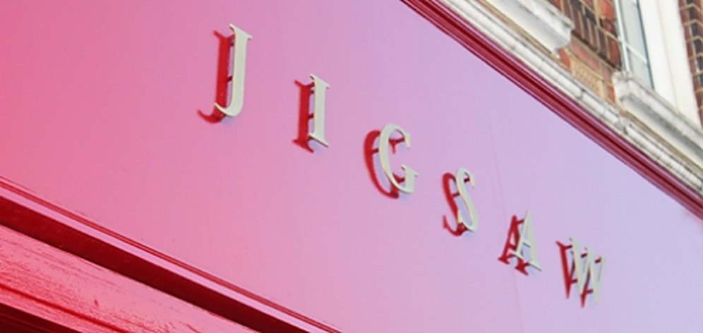 Jigsaw shop sign