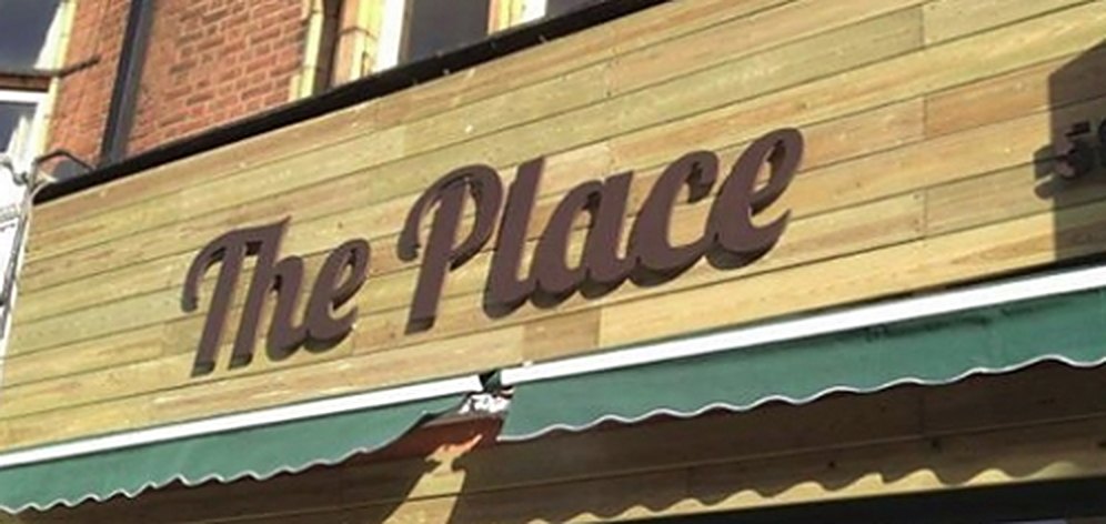 The Place shop sign